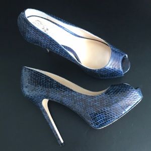 Snakeskin peep toe pumps
